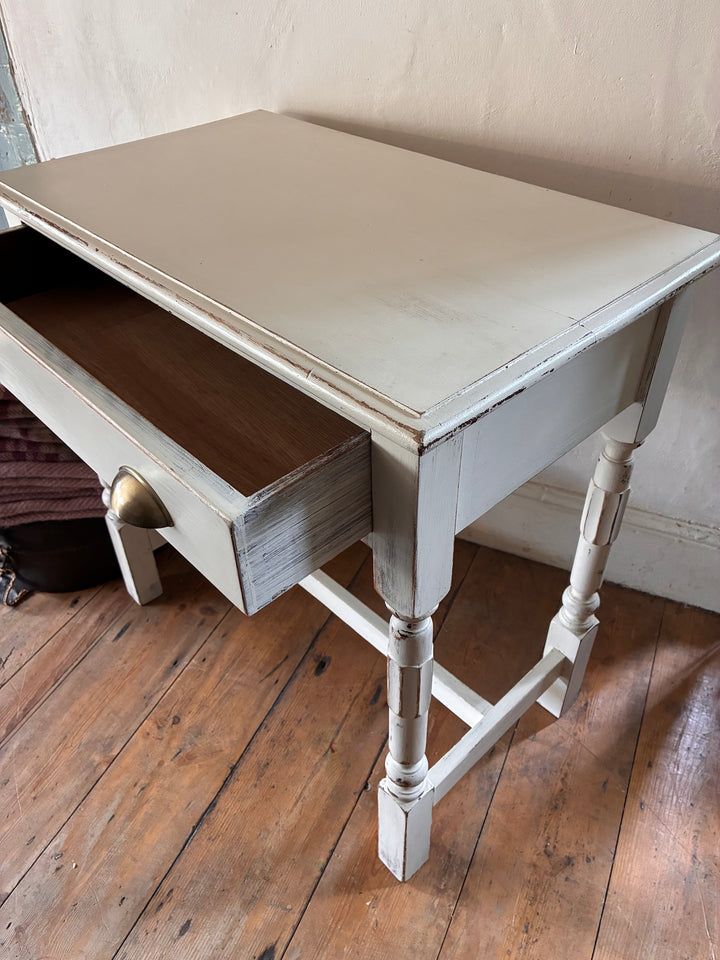 Vintage painted side table with drawer, off-white finish and brass cup handle, sourced from Source for the Goose, Devon