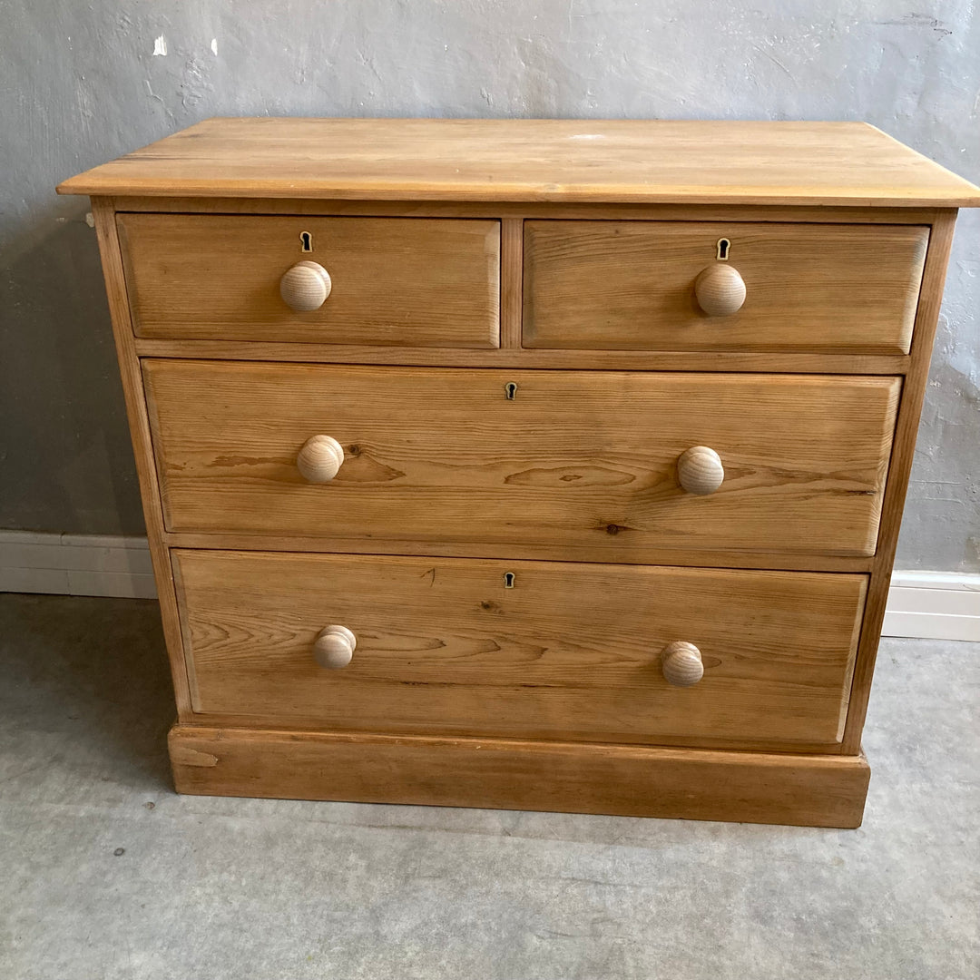 two over two pine chest of drawers with turned beech knobs