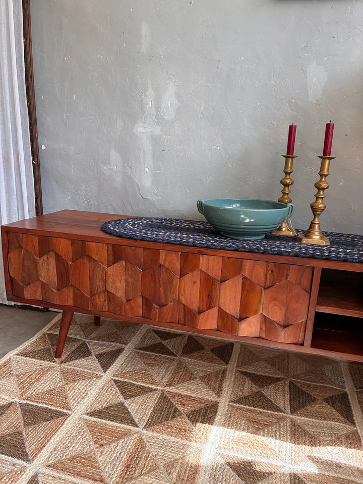 Retro Swoon Editions TV Stand with tessellated wood tiles, featuring a decorative bowl and candle holders.