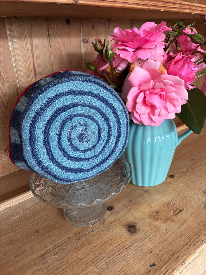 Blueberry Stripe Tulip Mini Basket by Source for the Goose, decorated with pink flowers in a blue vase.