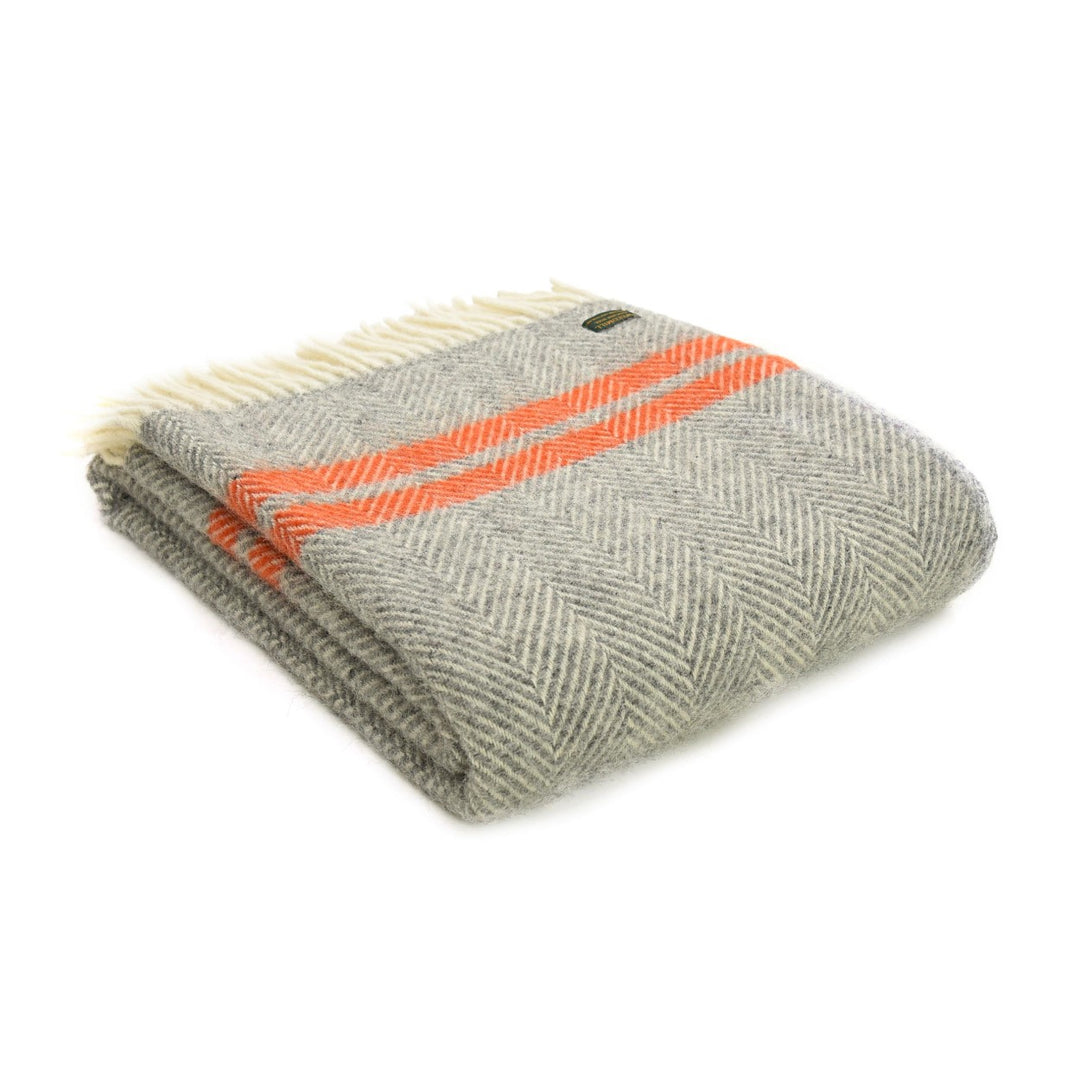 Source for the Goose Fishbone Grey and Pumpkin Wool Blanket, manufactured by Tweedmill