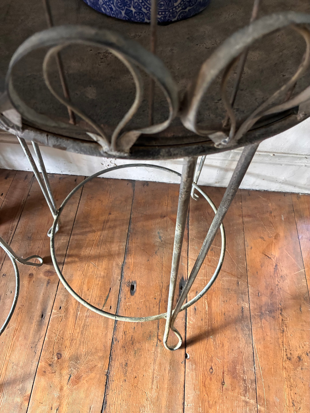 Bird Cage Style Plant Stand on Legs showcasing vintage metal design and sturdy base.