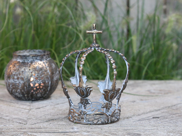 small metal decorative crown with aged gilded look