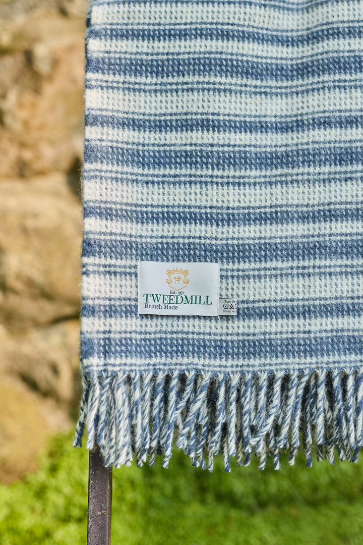 Tweedmill Blue Slate Wool Throw - Aber Stripe with blue stripes and cream tassels, perfect for cosy throws in Devon.
