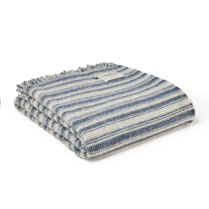 Tweedmill Blue Slate Wool Throw - Aber Stripe folded with blue and cream stripes and tassels, perfect for cozy throws.