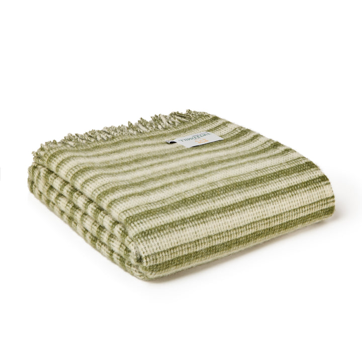 Tweedmill Olive Green Aber Stripe Wool Blanket folded with soft green and cream stripes and tassels, perfect for cozy comfort.