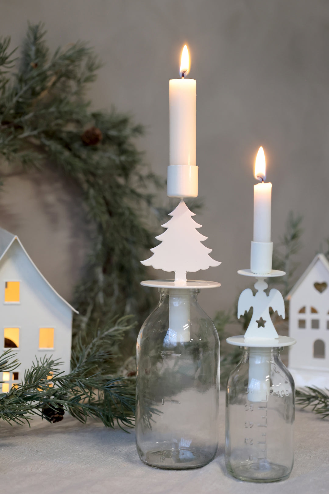 Angel Design Bottle Candle Holder with Christmas tree and angel, evoking festive elegance for the holidays.