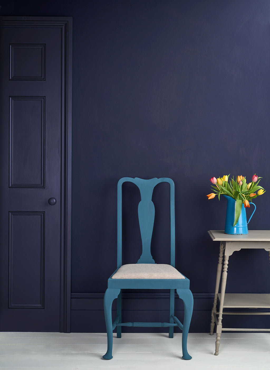 woodwork and door painted in Oxford Navy Satin Paint
