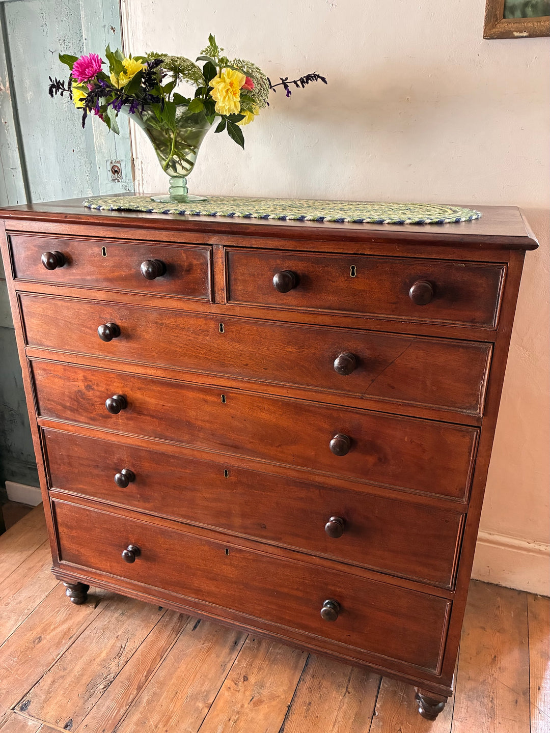 Tall Antique Mahogany Chest of Drawers showcasing traditional craftsmanship, versatile storage, and elegant design.