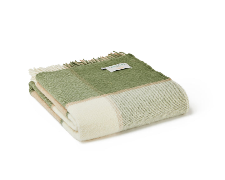 Tweedmill Block Check Olive Throw - Pure Wool folded blanket in olive green and cream colors with tassels.
