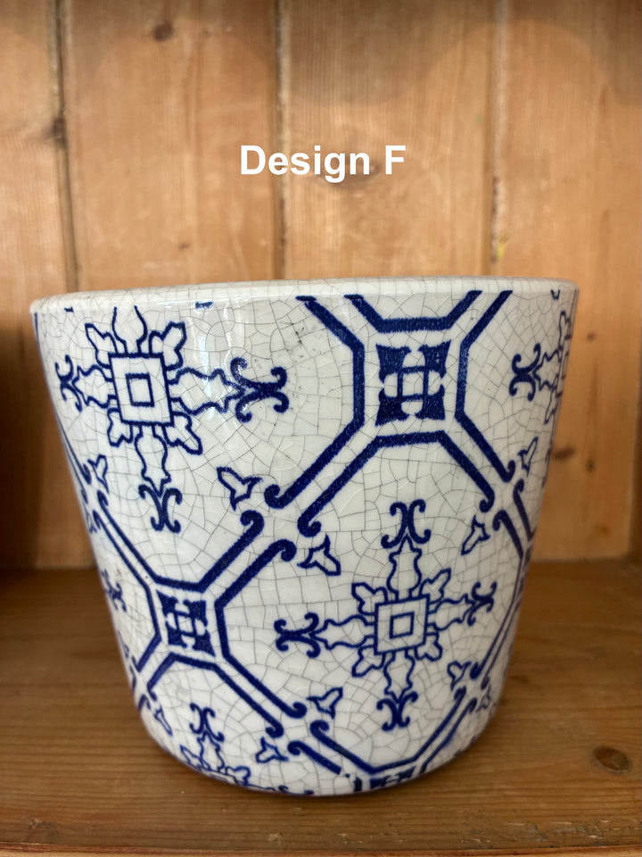 Handcrafted blue Dutch style flowerpot with intricate vintage design, perfect for home decor. Source for the Goose, Devon.