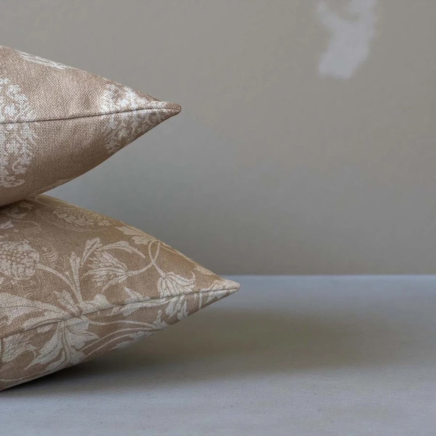 Bramble Light Corn Ochre Cushion with floral pattern on a light background, ideal for home decor.