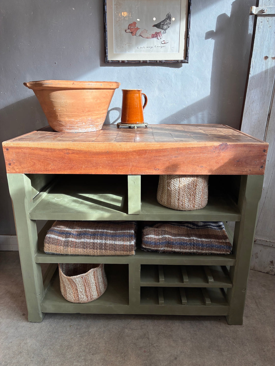 Butcher Block Kitchen Island - Olive Green with storage and decorative items, perfect for a functional kitchen.