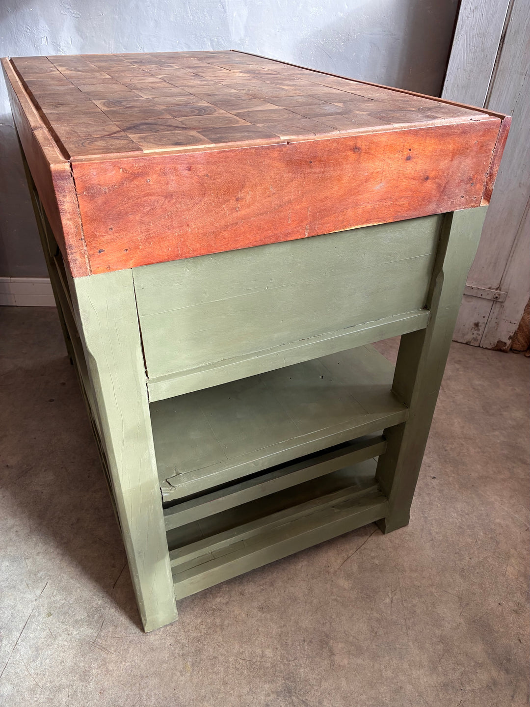 Butcher Block Kitchen Island - Olive Green showcasing a sturdy hardwood structure with ample storage compartments.