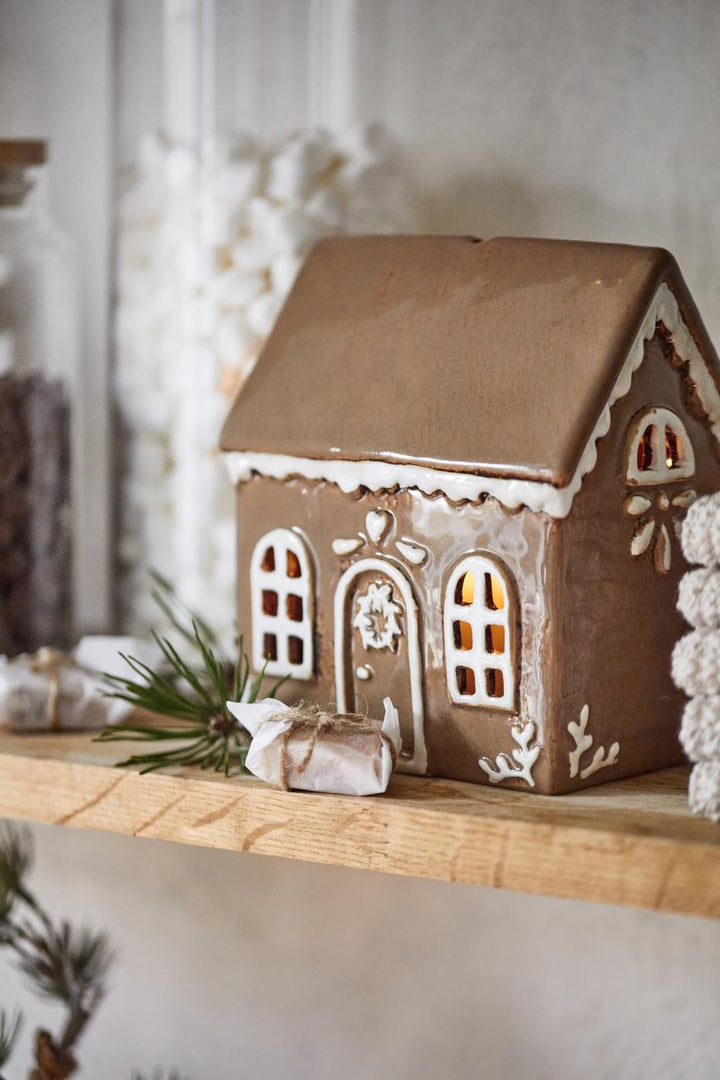 Small Rustic Ceramic Gingerbread House with two windows and door with wreath