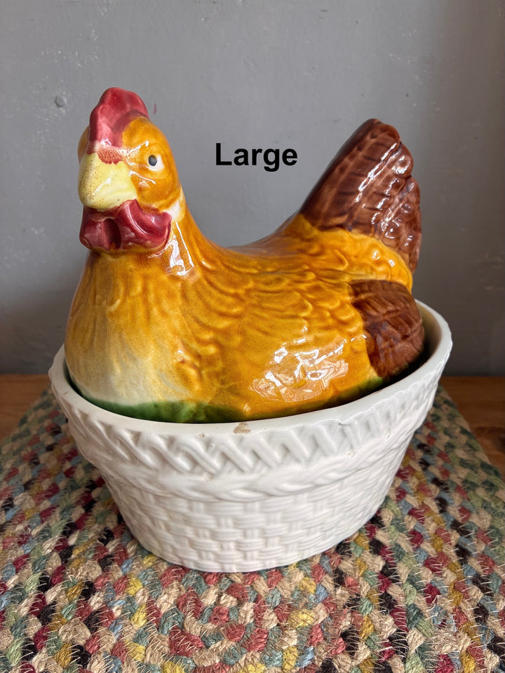 Colorful large Chicken Egg Holder - Portugese Ceramic in cream basket on a textured mat.