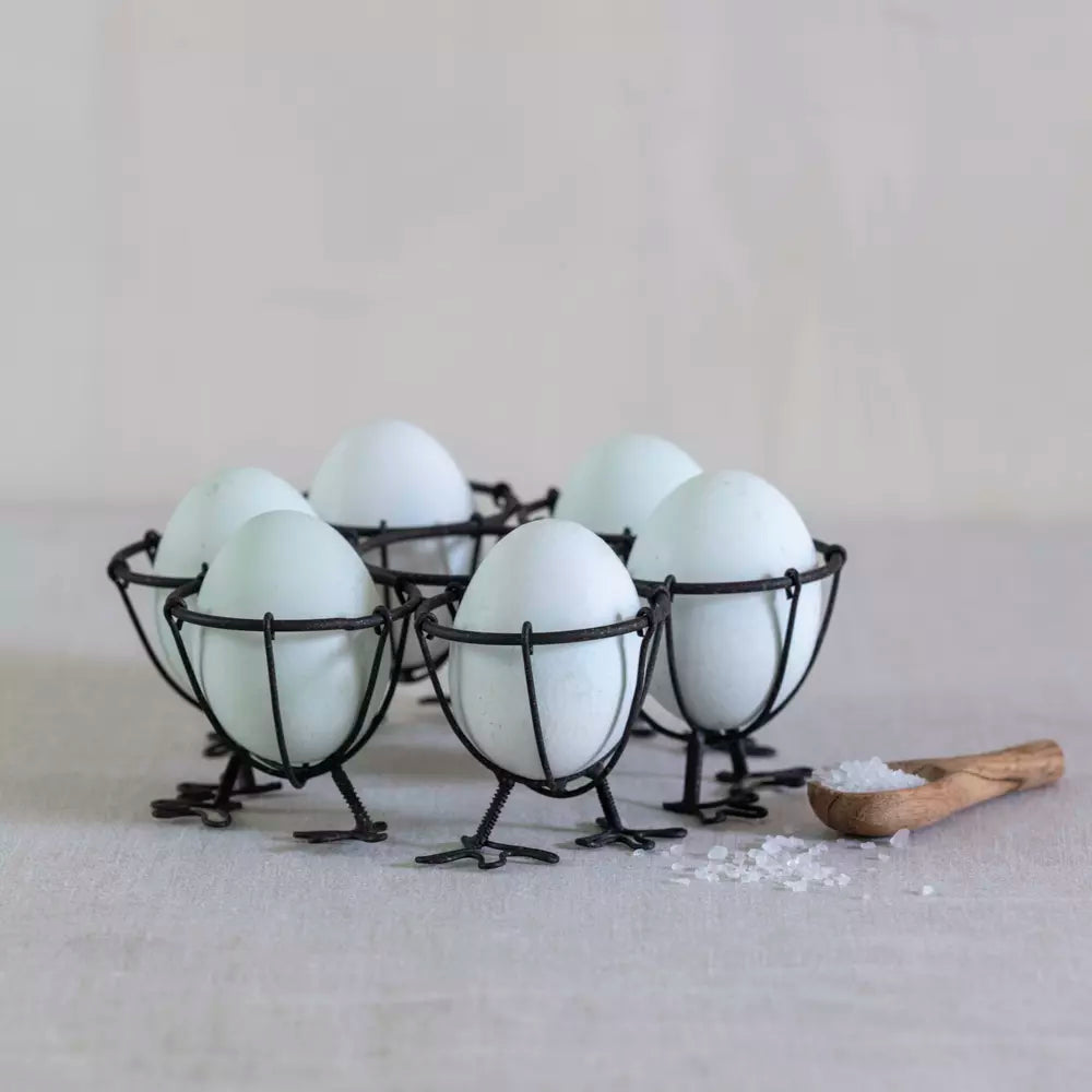 Chicken Feet Wire Egg Holder displaying six eggs in a vintage wire rack with chicken feet design.