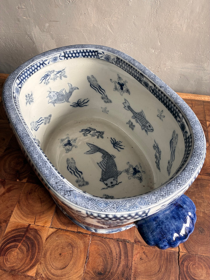Chinoiserie Blue and White Foot Bath Planter featuring intricate blue fish designs.