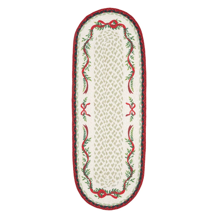 Christmas Ribbon Jute Table Runner- Christmas Tableware featuring festive greenery and red edging for traditional decor.