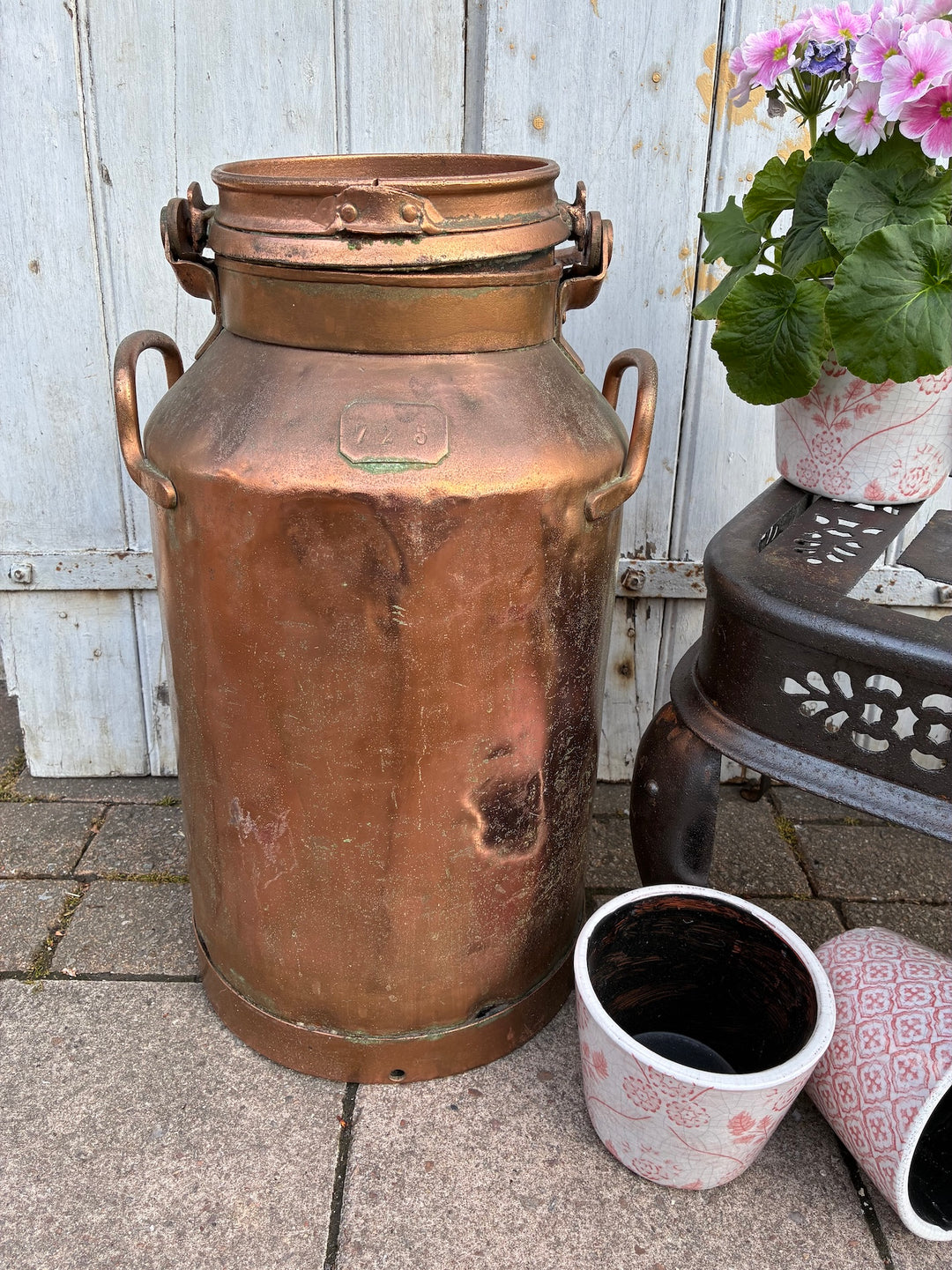Vintage copper plated milk churn with lockable lid, perfect for garden decor or as a unique planter from Source for the Goose, Devon.