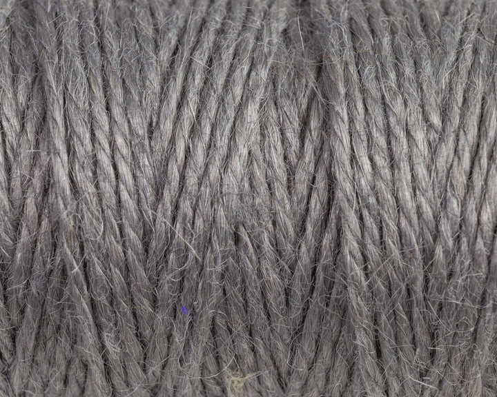 Nutscene Jute Twine on Hanging Recycled Lancashire Mill Bobbin - close-up of gray jute twine texture.