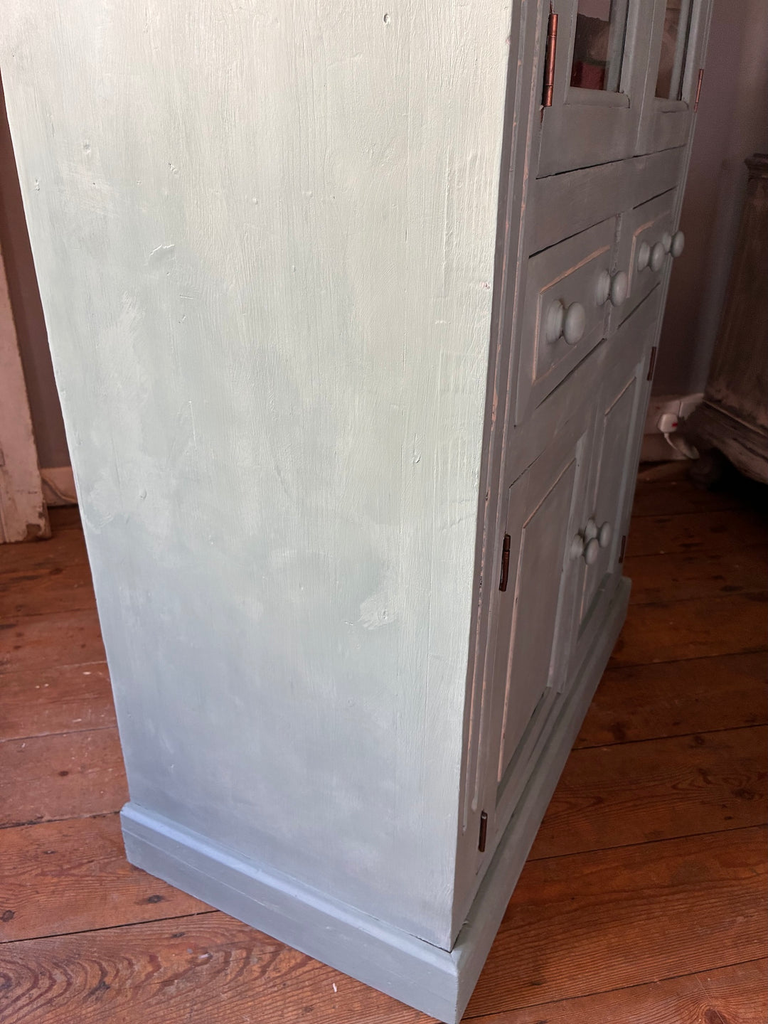 Duck Egg Blue Glazed Kitchen Dresser side view showcasing rustic charm and pale color.