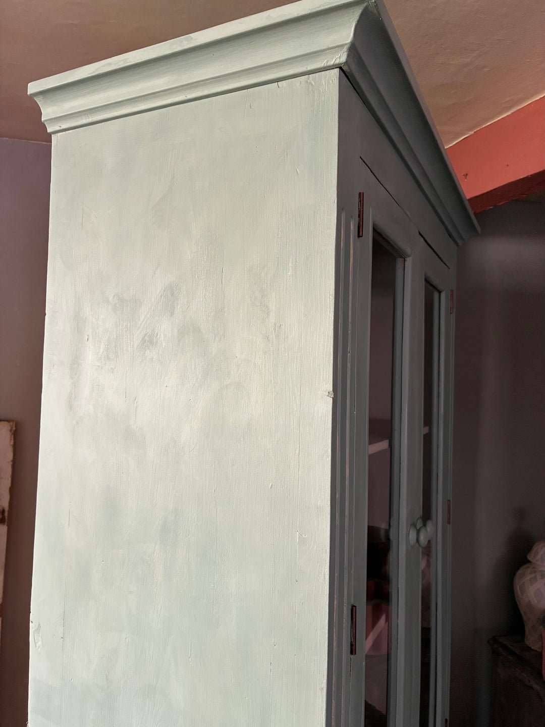 Duck Egg Blue Glazed Kitchen Dresser showcasing rustic charm and a pale pink interior.