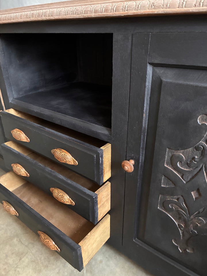 Deep Black Oak Sideboard - Hand Painted showcasing intricate carved details and stylish drawer handles.