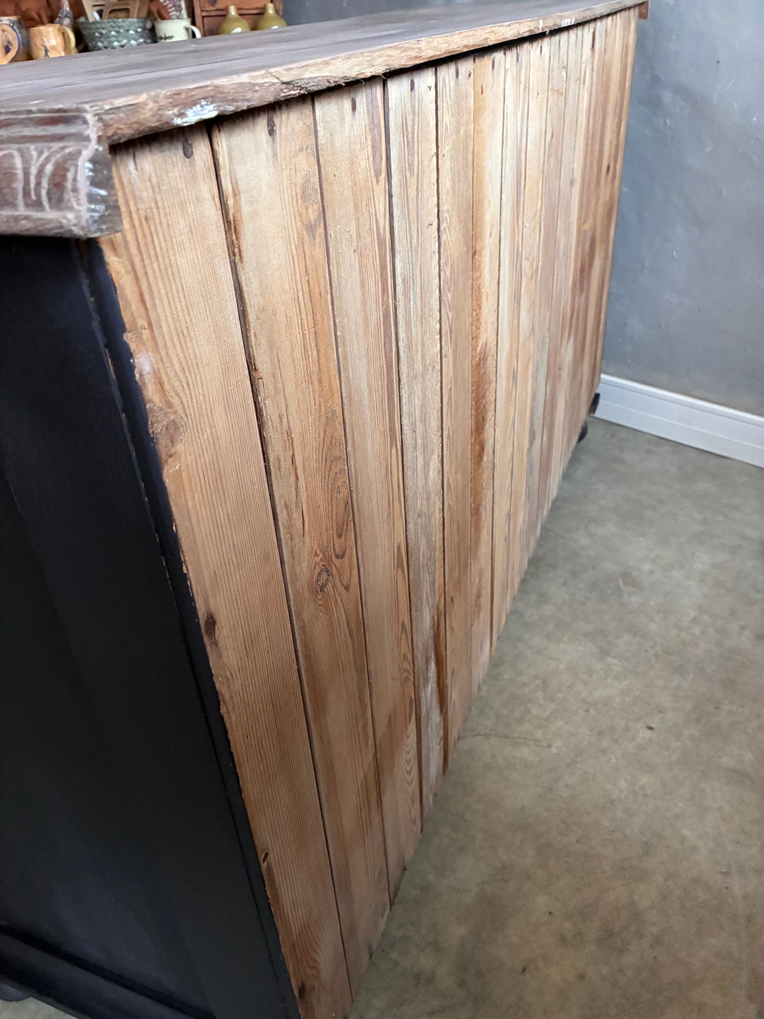 Deep Black Oak Sideboard - Hand Painted showing the rustic wooden side detail and industrial edges.