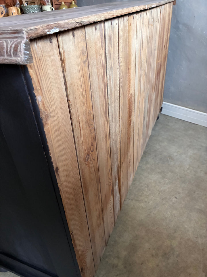 Deep Black Oak Sideboard - Hand Painted showing the rustic wooden side detail and industrial edges.