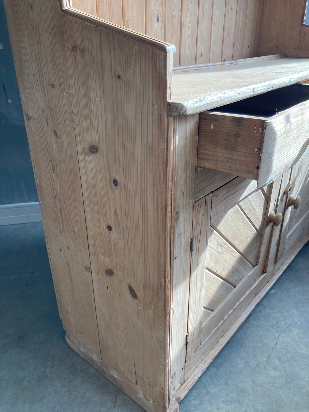 two drawers and cupboard below on pine dresser