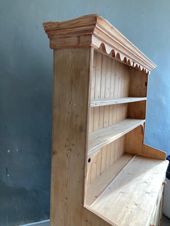 some minor damage to cornice on top of European Pine Dresser