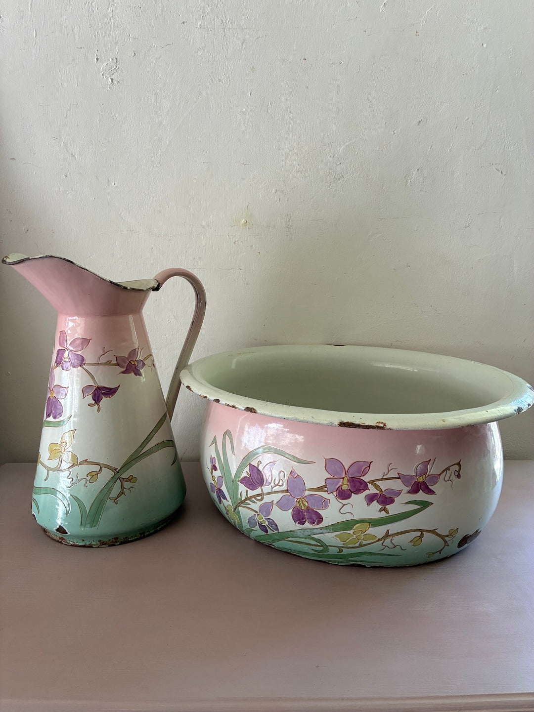 Art Nouveau French enamel jug and bowl set with pastel floral design from c1900, available at Source for the Goose, Devon.