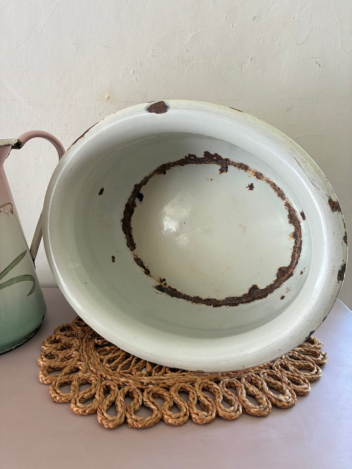 Vintage pastel floral enamel bowl with signs of age, showcasing Art Nouveau style, from Source for the Goose, Devon.