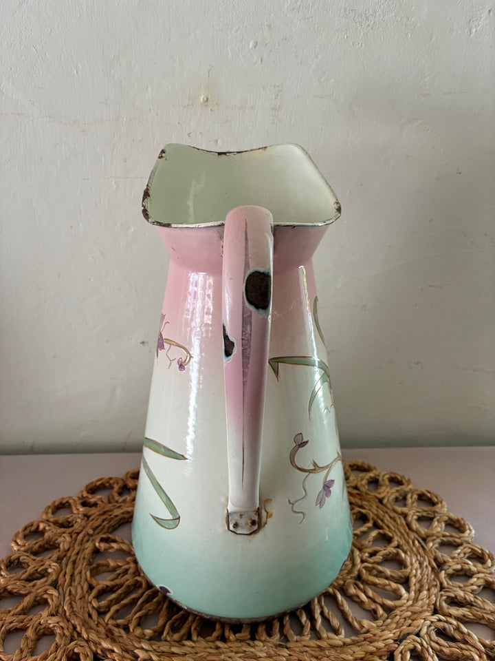 Art Nouveau French enamel jug in pastel colors with floral design, sourced from Source for the Goose, Devon.