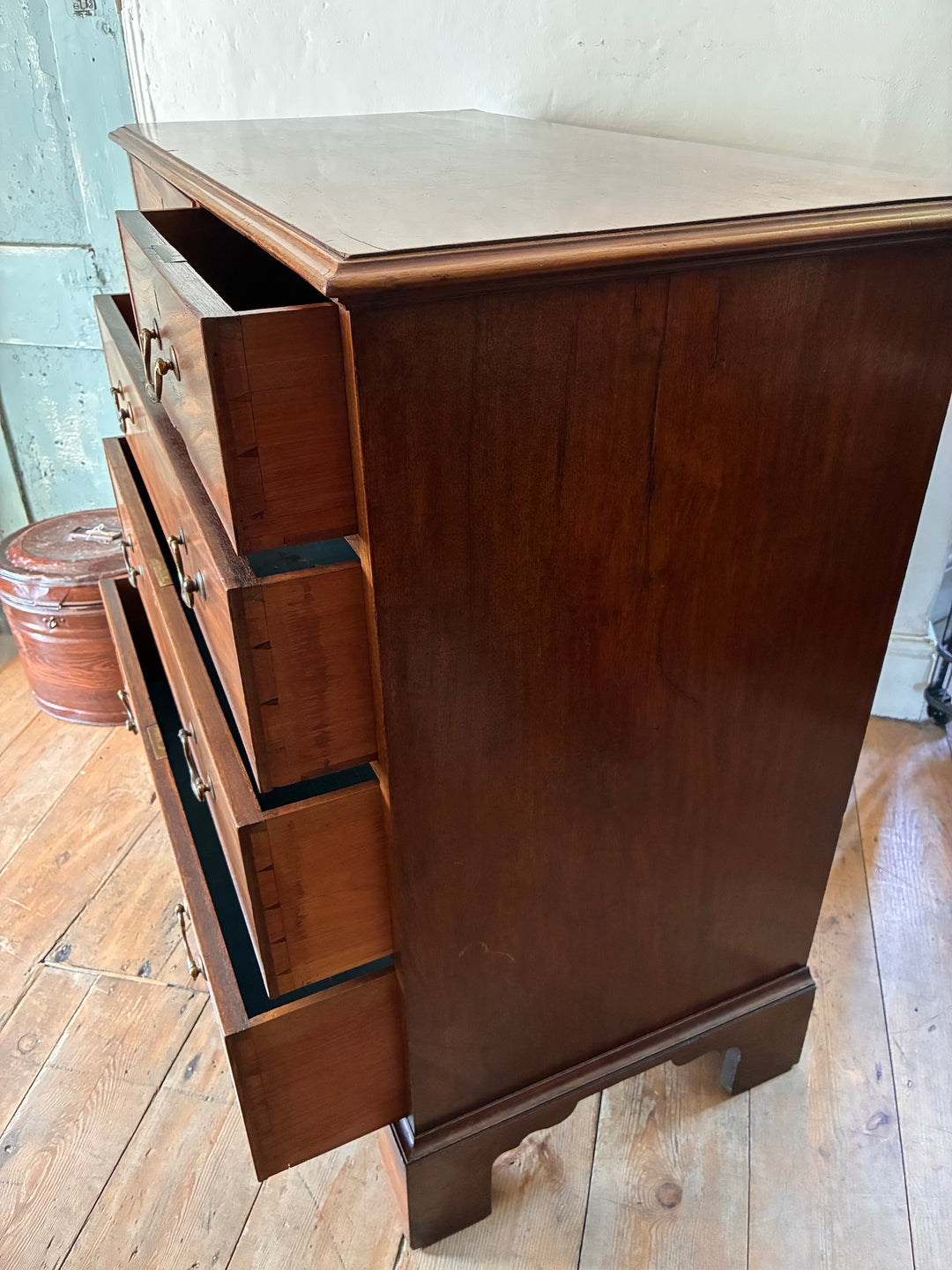 Antique Georgian Mahogany Chest of Drawers with original brass handles and blue paper lining, sourced from Source for the Goose, Devon.