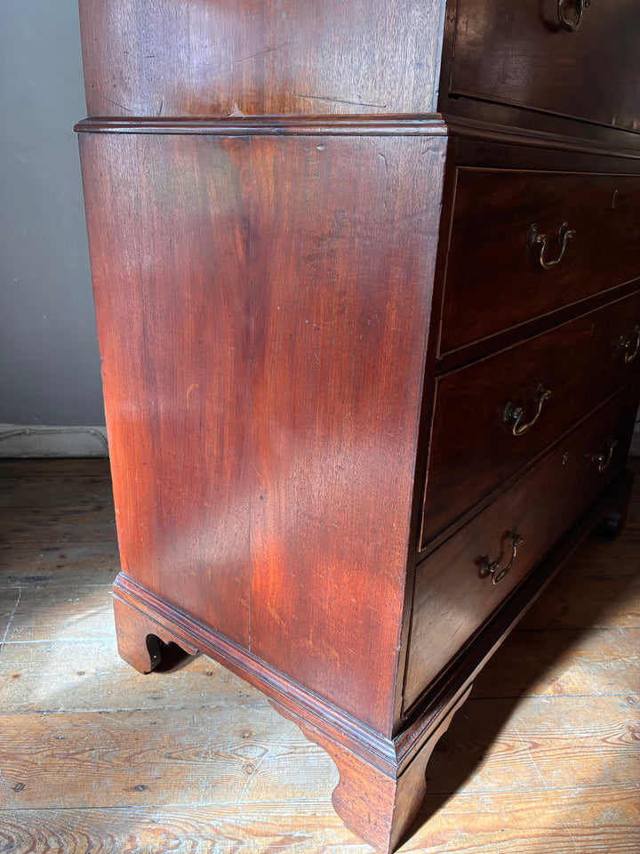 Georgian Mahogany Tall Boy - Chest on Chest showcasing antique mahogany with brass handles and splayed bracket feet.