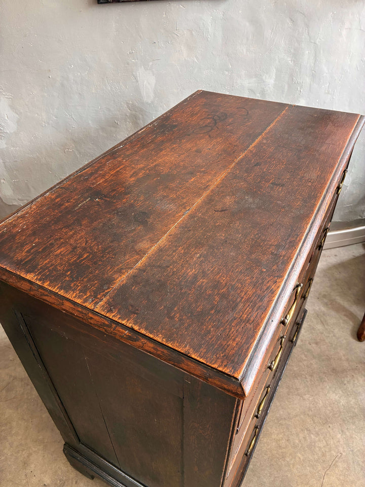 Top view of an Antique Oak Georgian Chest of Drawers showcasing its rich wood grain and classic design.