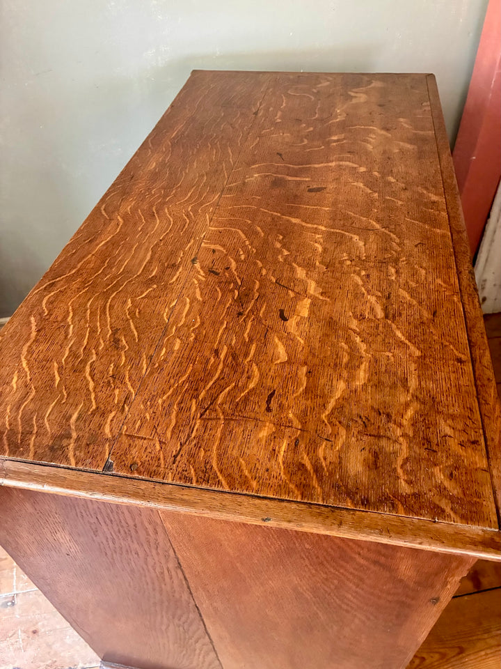 Top view of a Small Antique Georgian Oak Chest of Drawers showcasing rich wood grain and warm patina.