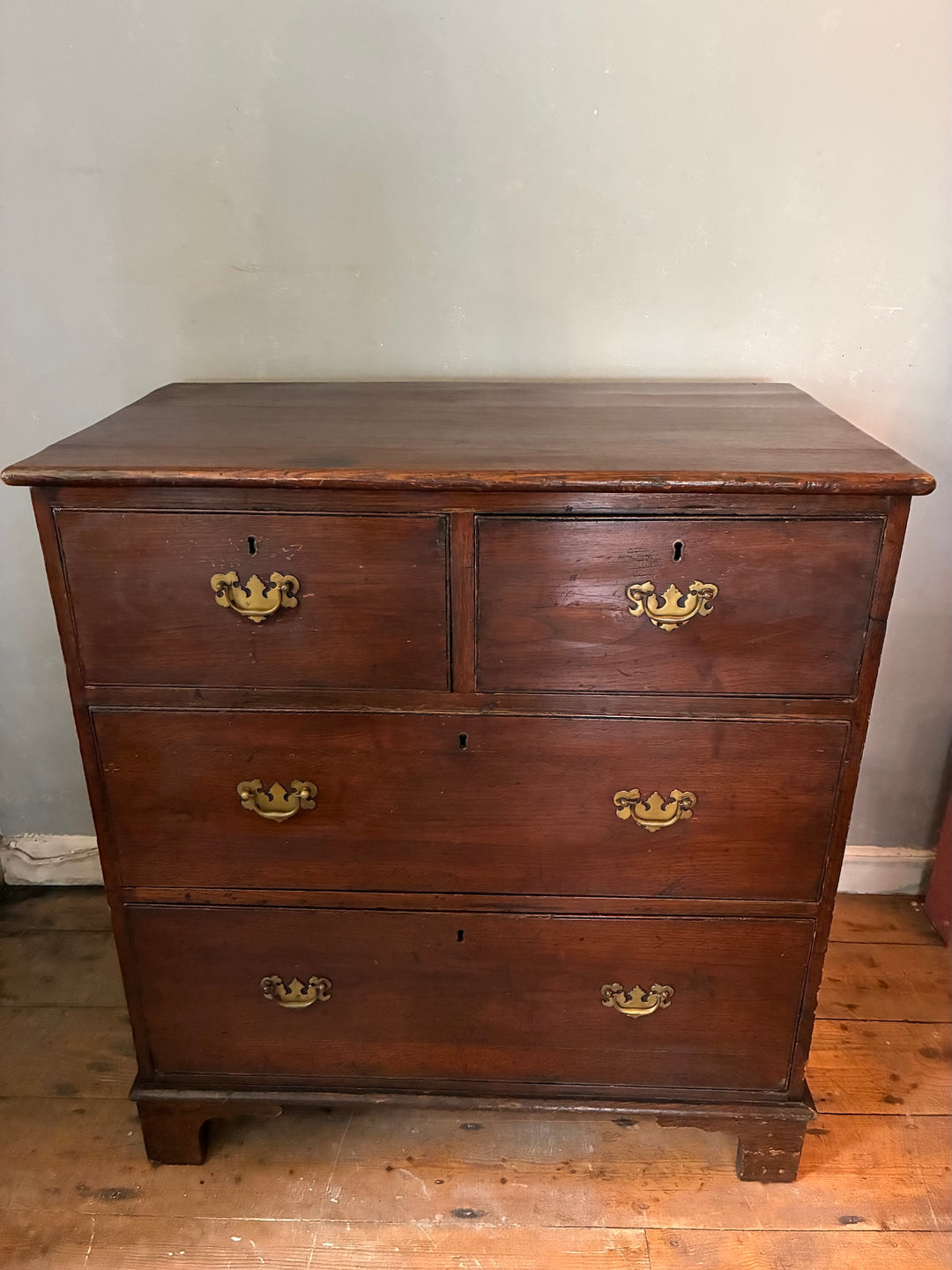 Antique Oak Chest of Drawers - Georgian showcasing brass handles and rustic charm.