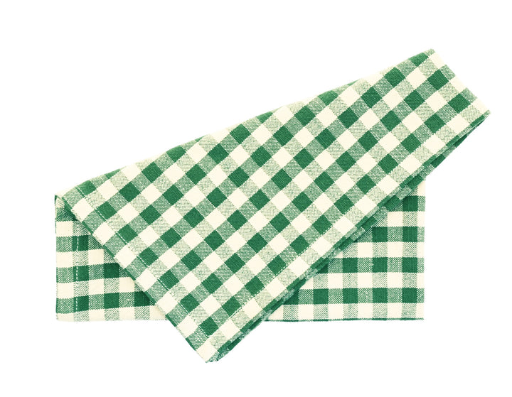 Forest Green Gingham Napkin Set - Set of Four placed neatly for dining decor.