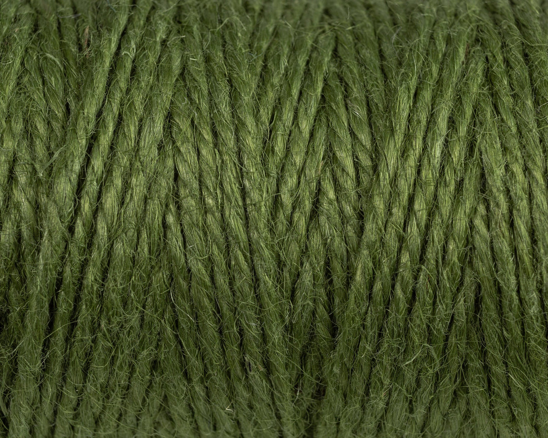 Nutscene Jute Twine on Hanging Recycled Lancashire Mill Bobbin in rich green color.