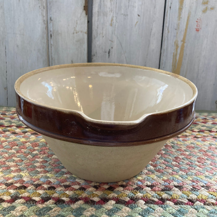 brown glazed spout and rim on old dairy bowl