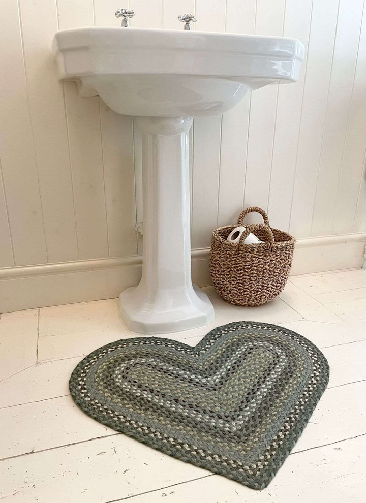 jute heart Braided Rug in Seaspray used as a bathroom mat