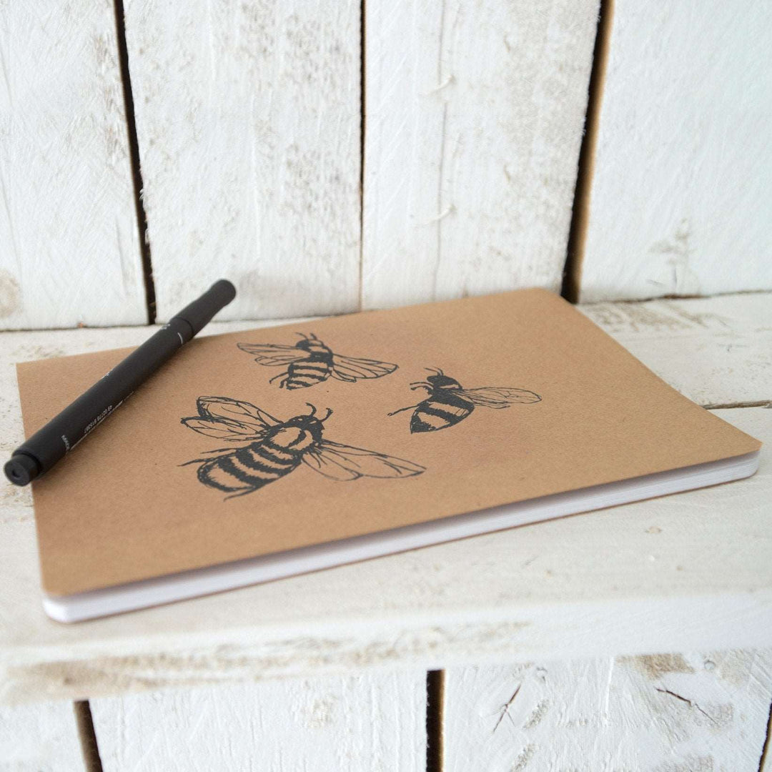 small brown Kraft card covered notebook with bee design