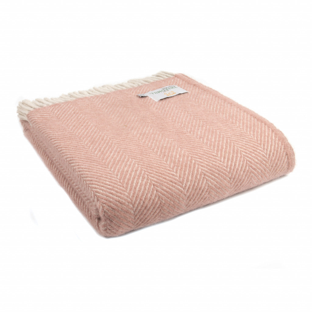 Tweedmill Herringbone Dusky Pink and Pearl Wool Blanket from Source for the Goose, soft pink with white tassels.