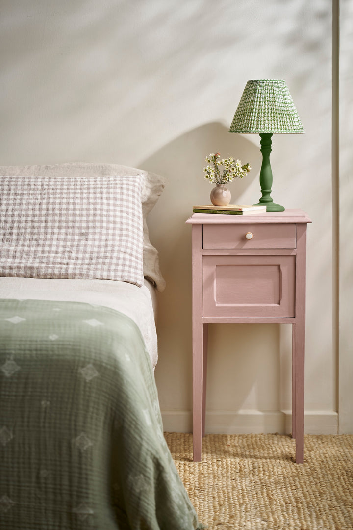 500ml Jaipur Pink Chalk Paint used on a bedside table, enhancing a modern bedroom with a pastel accent.