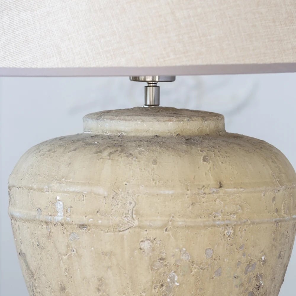 Marius Lamp - Stoneware Base With Woven Linen Shade featuring a textured stoneware jar base.