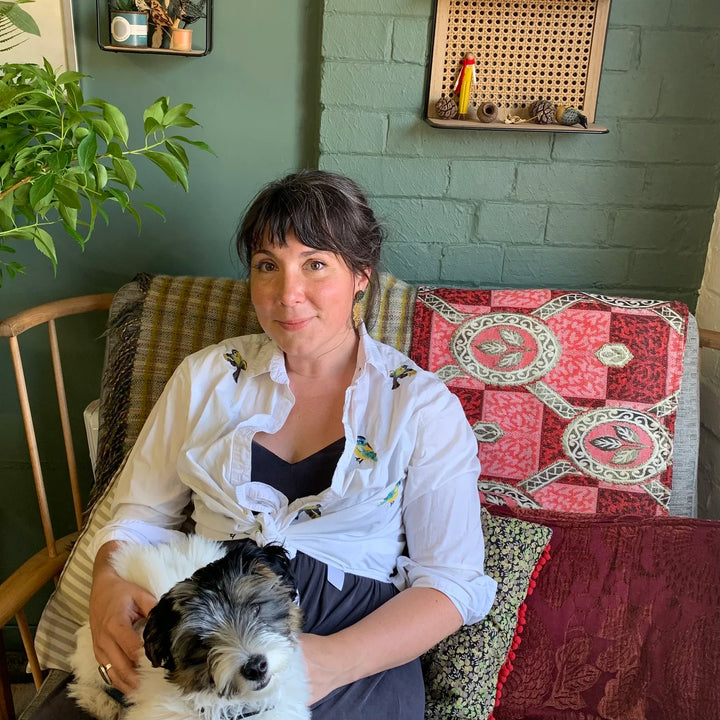 Adding Botanical Detail – Chalk Paint Workshop with Lily Faith | 11 March, workshop participant with dog in cozy setting.