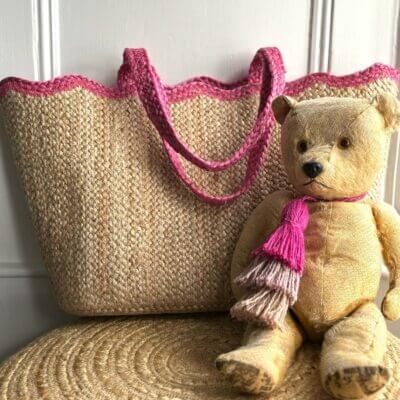 pretty jute shopping basket with pink scalloped edge and handles